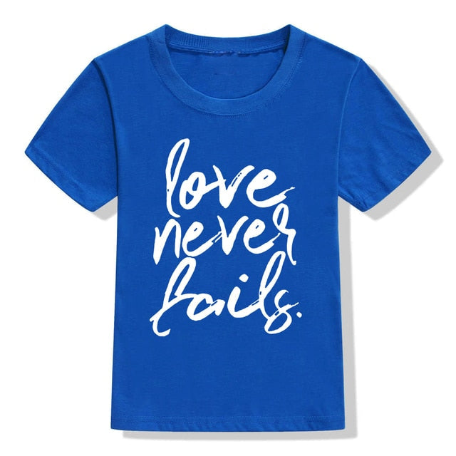 Love Never Fails Girls Christian Heart Shirt