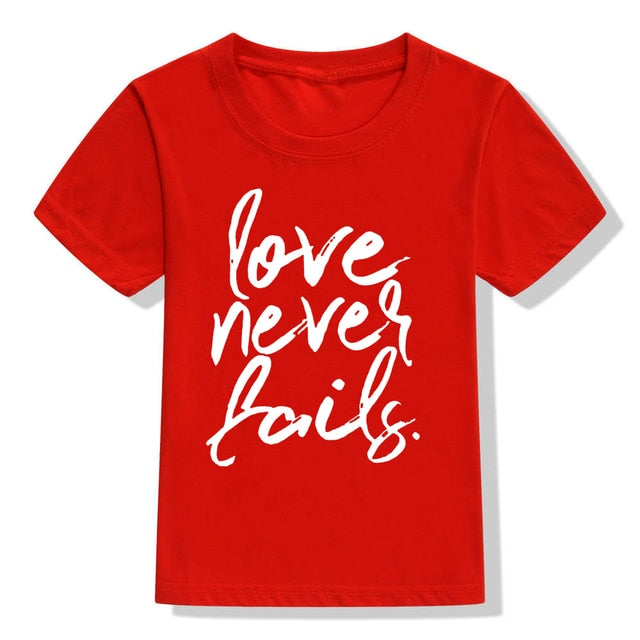 Love Never Fails Girls Christian Heart Shirt