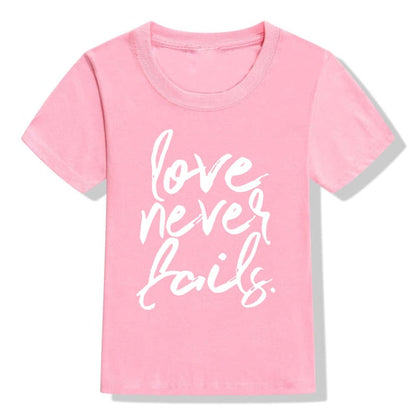 Love Never Fails Girls Christian Heart Shirt