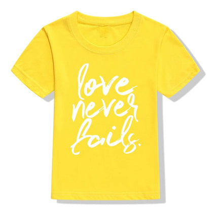 Love Never Fails Girls Christian Heart Shirt